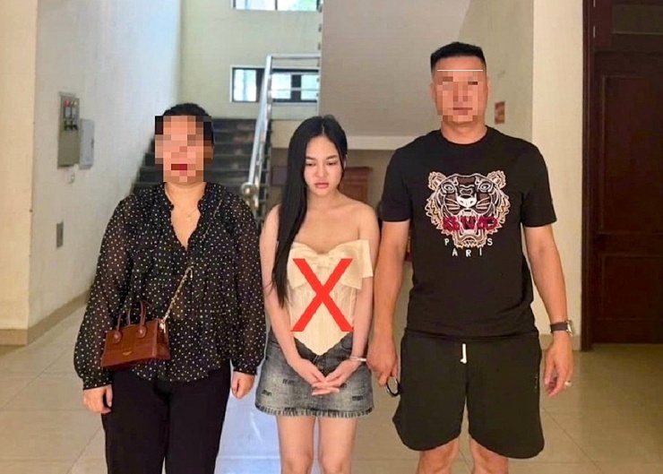 Đối tượng Lương Thị Tâm( đứng giữa). (Ảnh: Công an Nghệ An).