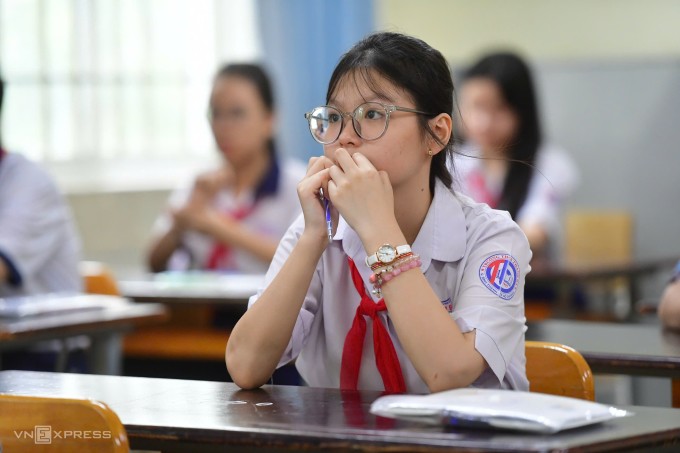 Thí sinh thi lớp 10 tại trường THCS Đống Đa, TP HCM, sáng 1/6. Ảnh: Thanh Tùng