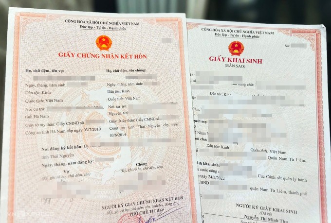 Giấy khai sinh sẽ được làm liên thông cùng thường trú, cấp thẻ bảo hiểm y tế, căn cước. Ảnh: Phạm Dự