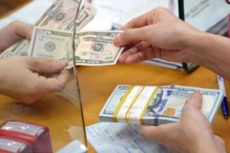 Tỷ giá USD/VND hôm nay 4/6: Ngân hàng "lặng sóng", thị trường chợ đen tăng giá