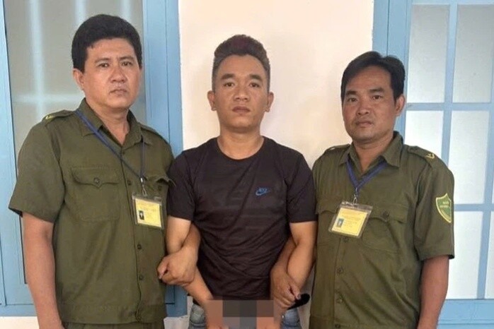 Nghi phạm L.Q.K. tại cơ quan công an sau khi bị bắt giữ.
