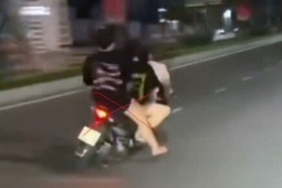 3 thiếu nữ đi xe máy lạng lách, đánh võng trên đường