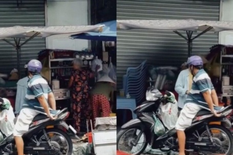 Clip chồng kéo áo che yên xe máy cho vợ khỏi nóng khiến dân mạng tan chảy