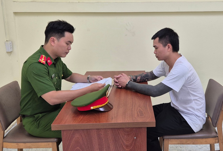 Lê Anh Điệp tại cơ quan điều tra. Ảnh: CACC