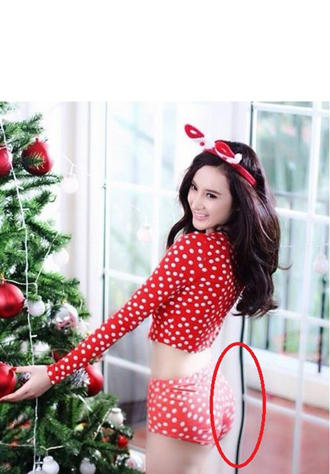 Angela Phương Trinh tự &#34;nâng&#34; vòng 3 của mình tới mức méo cả cửa kính.