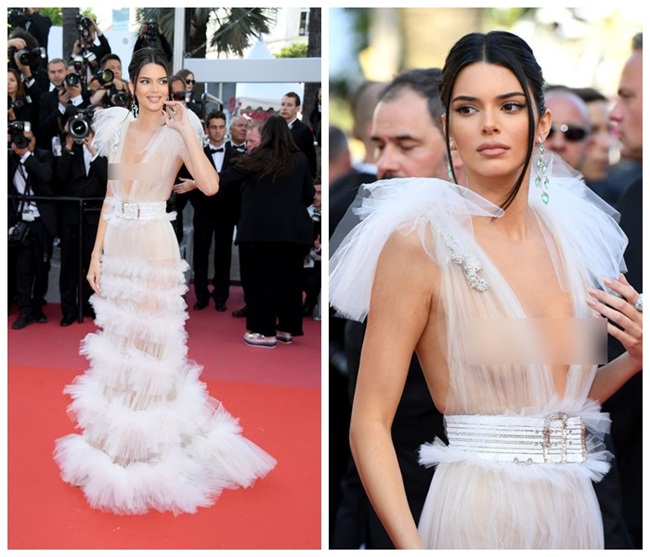 Giới mộ điệu thời trang đổ dồn sự chú ý vào Kendall Jenner khi cô xuất hiện trên thảm đỏ LHP Cannes. Siêu mẫu 9x để lộ toàn bộ vòng một trong chiếc đầm xuyên thấu táo bạo của NTK Schiaparelli.