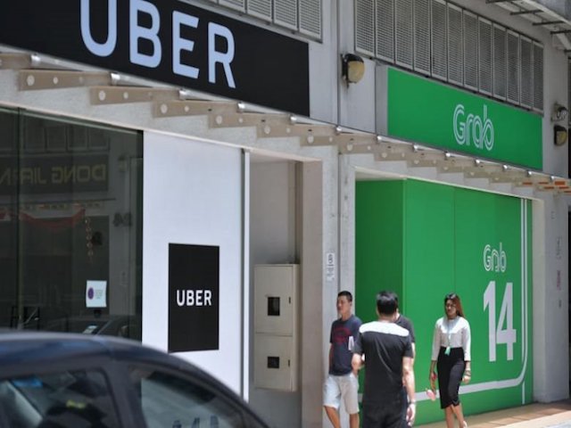 Thương vụ Grab mua Uber có thể bị hủy bỏ, Grab đối mặt với án phạt tài chính