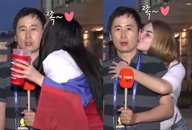 Hai người đẹp liên tiếp cưỡng hôn nam MC đang trực tiếp World Cup - 1