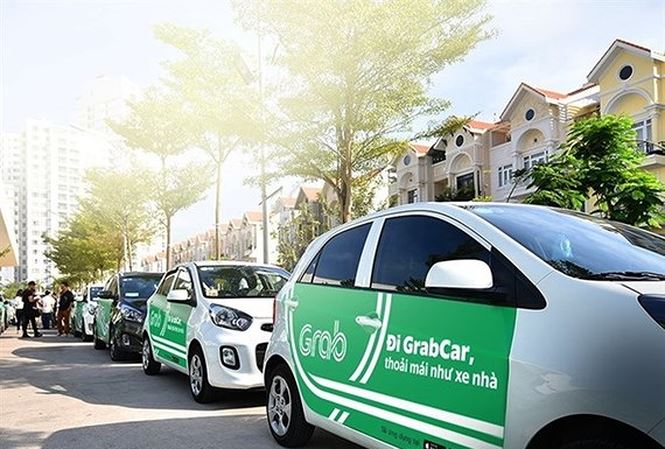 Grab sẽ phải gắn biển “taxi điện tử”? - 1