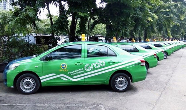 Gắn mào “taxi điện tử” cho Grab: Có xóa bỏ thế “một mình một ô”? - 1