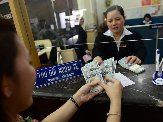 Kinh doanh - USD biến động: Kẻ cười, người khóc