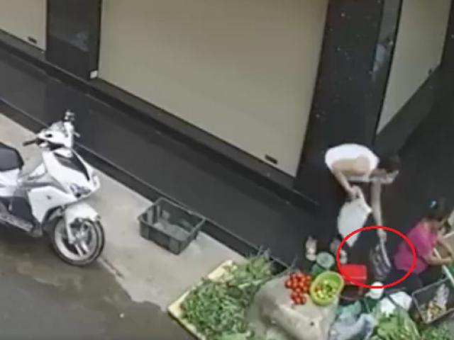 Pháp luật - Bắt cô gái đi xe tay ga trộm túi xách của bà bán rau lề đường