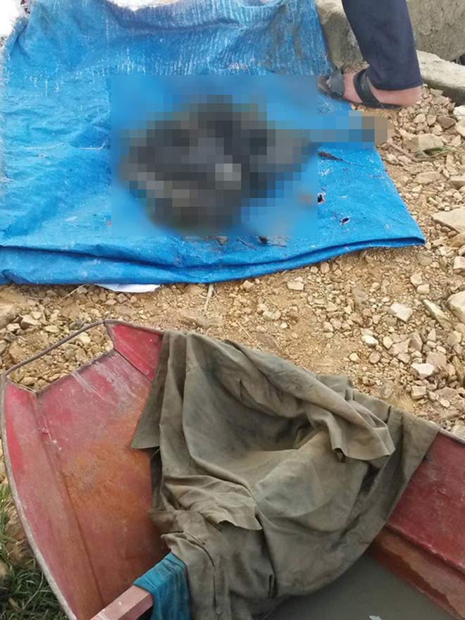 Phát hiện bộ hài cốt cùng quần áo đàn ông dưới lạch nước - 2