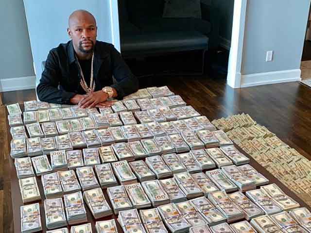 Thể thao - Mayweather gây nhức nhối: Mang "núi tiền" 46 tỷ đồng phủ trắng bàn