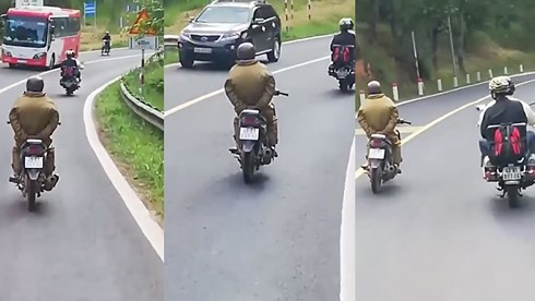 Nam thanh niên điều khiển xe máy buông cả hai tay khi đổ đèo Prenn hồi tháng 9/2018.