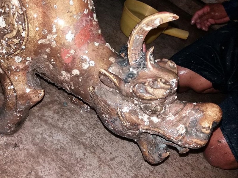 Phần đầu pho tượng quái thú hai đầu (Ảnh: Pháp luật TP.HCM)