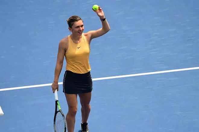 Simona Halep ngược dòng để vượt qua vòng 2