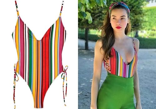 Hà Hồ đã xuất sắc khi kết hợp monokini với quần cạp cao, ống rộng.