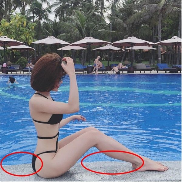 Diệp Lâm Anh bóp méo cả thành bể bơi để có tấm hình đẹp. 