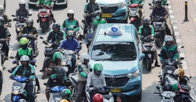 Grab, Go-Jek lo sợ hiệu ứng domino từ luật Uber tại Mỹ - 1