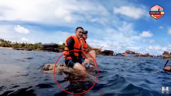 Quang Vinh, Phạm Quỳnh Anh ngồi lên một tảng san hô khối còn sống có tên&nbsp;Porites