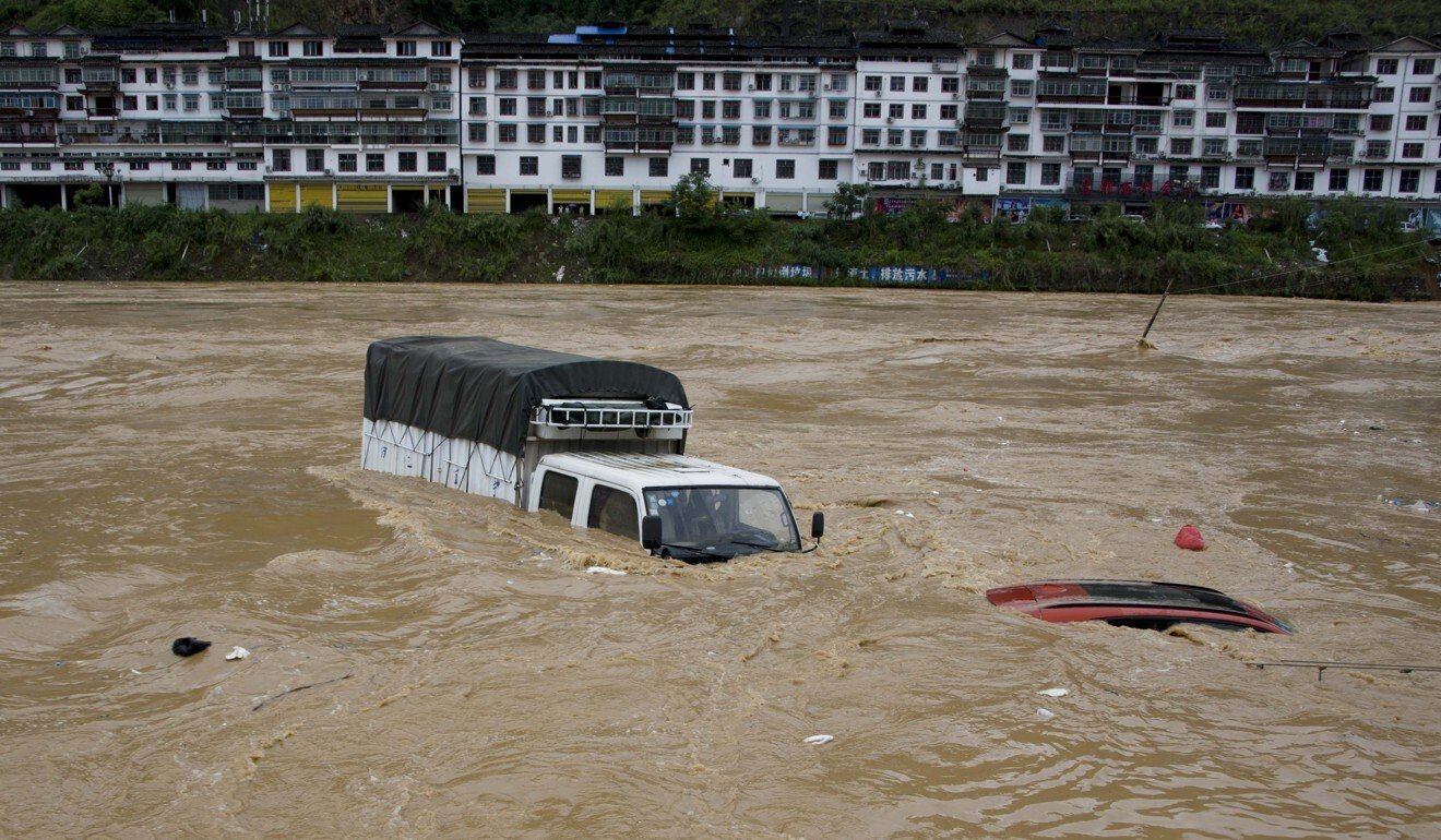Ngập lụt nghiêm trọng ở huyện Tòng Giang, tỉnh Quý Châu, Trung Quốc hồi tháng 6. Ảnh: Tân Hoa xã