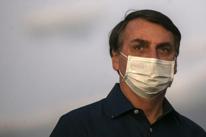 Tổng thống Brazil Jair Bolsonaro tiếp tục có kết quả dương tính với SARS-CoV-2 lần thứ 3. Ảnh: GETTY/CNN