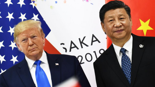 Tổng thống Mỹ Donald Trump (trái) và Chủ tịch Trung Quốc Tập Cận Bình tại Hội nghị G20 ở Nhật Bản năm ngoái. Ảnh: Reuters