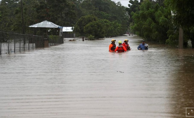 Cảnh ngập lụt sau khi bão Laura tràn qua Cộng hòa Dominica vào ngày 23.8.
