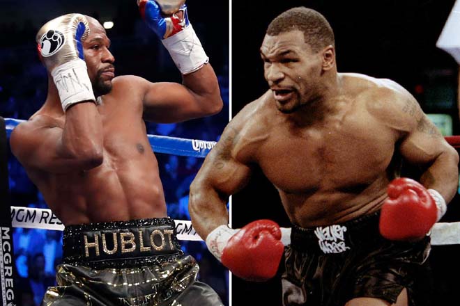 Mayweather (trái) mỉa mai quyết định quay trở lại của Mike Tyson