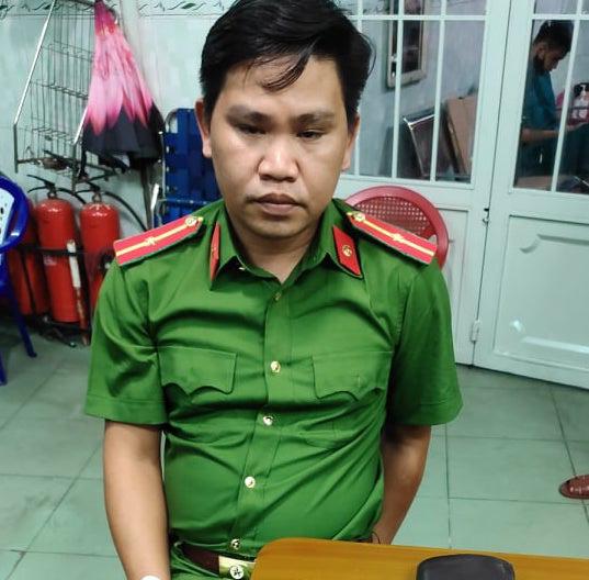 Trần Hồng Thái tại cơ quan công an