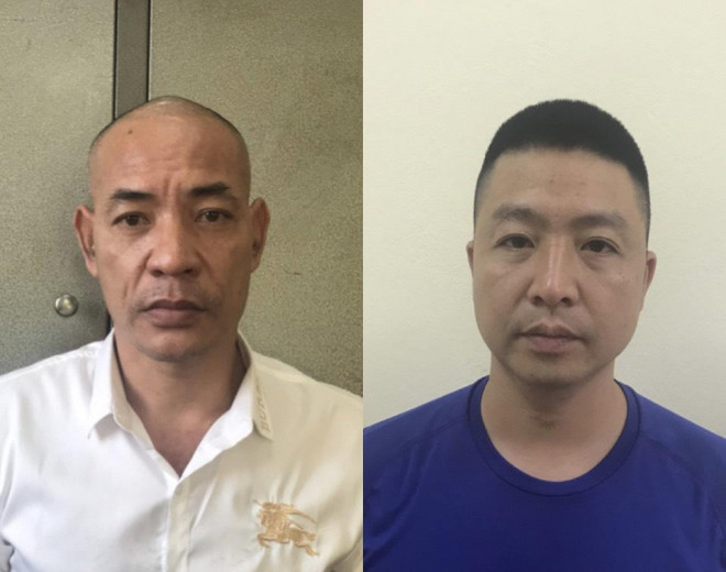 Nguyễn Văn Dũng (áo trắng, tức Dũng "trọc") và Lê Đức Hùng tại cơ quan công an - Ảnh: Bộ Công an