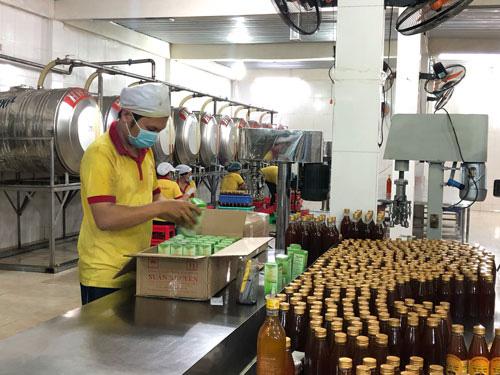 Các giải pháp hỗ trợ sắp tới cần tác động tới cả cung và cầu để giúp doanh nghiệp vượt qua khủng hoảng. Ảnh: PHƯƠNG AN