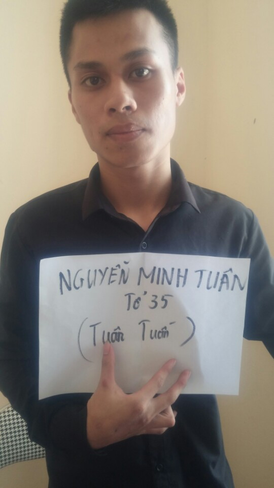 Nguyễn Minh Tuân tại trụ sở công an.