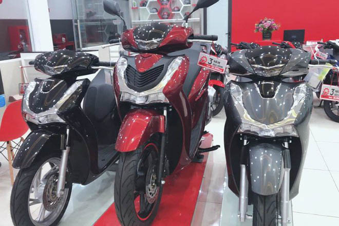 Honda điều chỉnh giá loạt xe máy: SH tăng mạnh nhất - 1