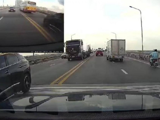 Tin tức trong ngày - Phớt lờ biển cấm, người đi mô tô vô tư lên cầu Thăng Long