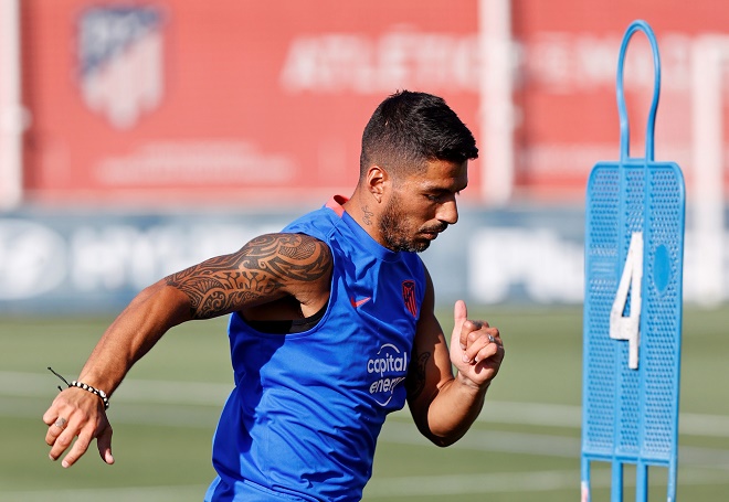 Suarez đã trở lại sau kỳ nghỉ hè