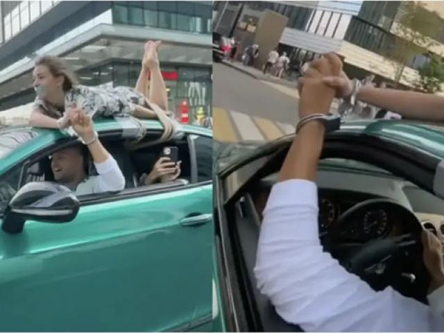 Bạn trẻ - Cuộc sống - Clip: Anh chàng còng tay, trói bạn gái trên nóc xe Bentley gây choáng