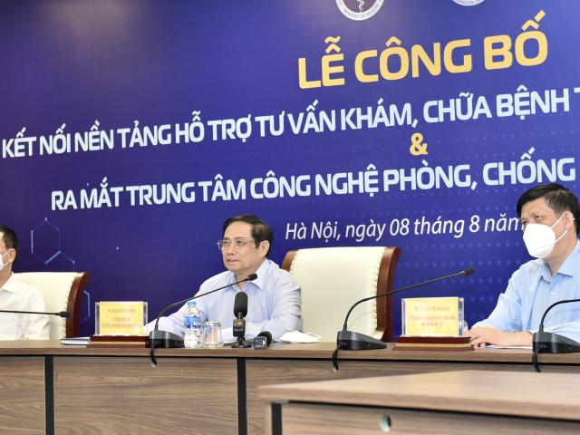 Thủ tướng Phạm Minh Chính dự lễ công bố kết nối Nền tảng hỗ trợ tư vấn khám, chữa bệnh từ xa (Telehealth) tới 100% tuyến huyện. - Ảnh: VGP/Nhật Bắc.