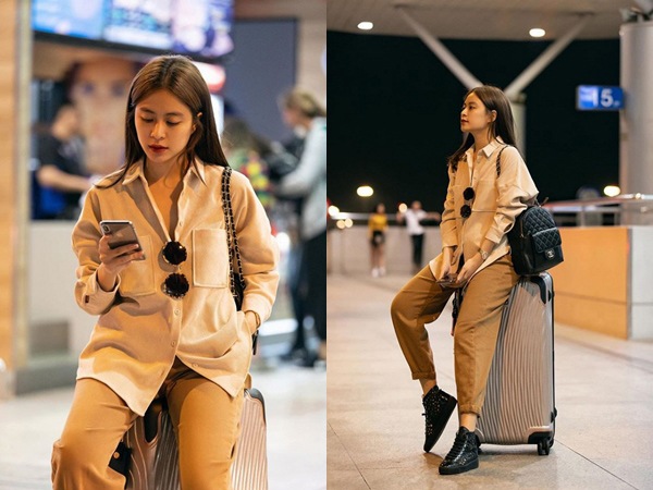 Kín từ trên xuống dưới với sơ mi và quần kaki phối với sneaker nhưng Hoàng Thùy Linh vẫn được khen ngợi bởi phong cách cá tính.