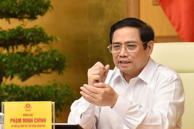 Thủ tướng Phạm Minh Chính chủ trì cuộc họp tối 19-8. Ảnh: VGP