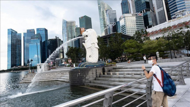 Singapore vẫn đang thận trọng tiến hành từng bước mở cửa đất nước để "sống chung với COVID-19". Ảnh: Reuters