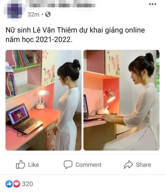 Một nữ sinh THPT thướt tha tà áo dài trắng không khác gì khi đến lớp, để tham gia khai giảng trực tuyến qua mang hình laptop.