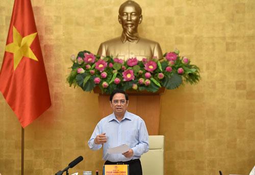 Thủ tướng Phạm Minh Chính họp trực tuyến với hơn 9.000 điểm cầu để chỉ đạo công tác phòng chống dịch Covid-19, ngày 5-9. Ảnh: NHẬT BẮC