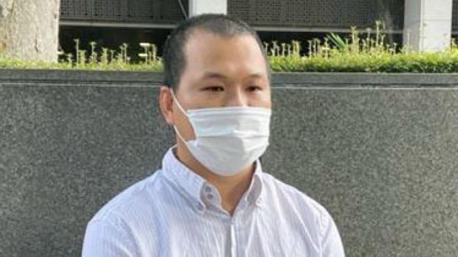 Anh Lê Anh Hào, 39 tuổi, cha của bé Nhật Linh, chia sẻ sau phiên toà. Ảnh: Kyodo