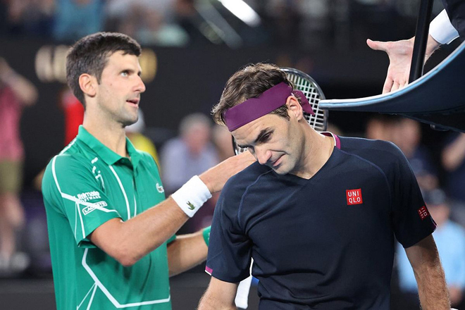 Djokovic (trái) chạm mốc 340 tuần giữ số 1, bỏ xa người đứng thứ hai, Federer (phải)