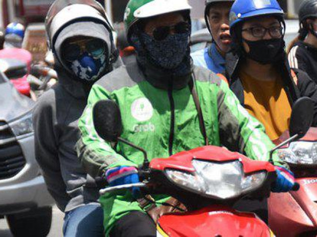 Thị trường - Tiêu dùng - Bộ Công Thương yêu cầu Grab làm rõ việc thu "phụ phí nắng nóng", "mưa lớn", "kẹt xe"...