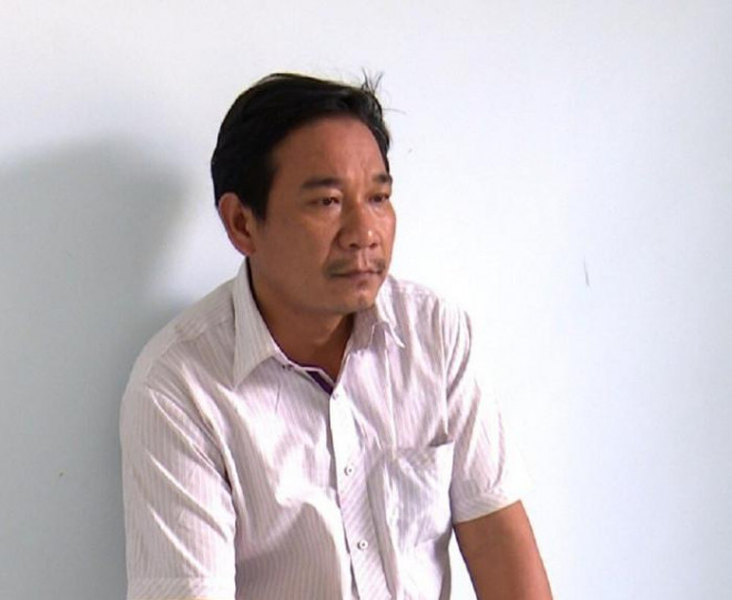 Lương Bá Tuấn tại cơ quan công an. Ảnh Nghiêm Túc