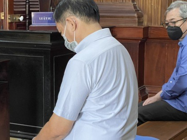 Pháp luật - Giám đốc ngân hàng nhận hối lộ 2 bao tiền mặt