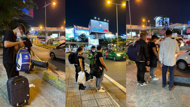 Hành khách rất khó khăn để đón taxi ở sân bay Tân Sơn Nhất - Ảnh: NLĐO